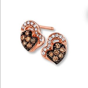 Authentic LeVian® diamond stud earrings.